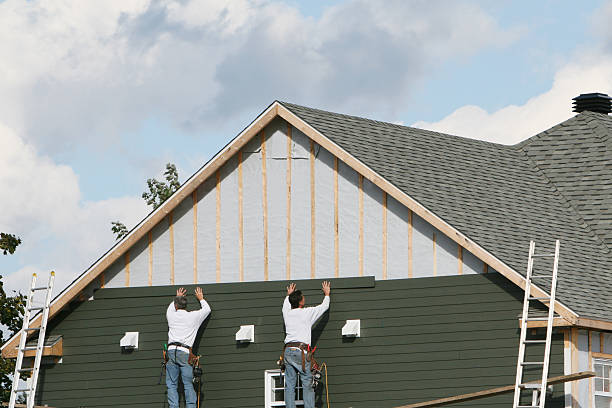 Professional Siding Replacement technician working in Hood, VA